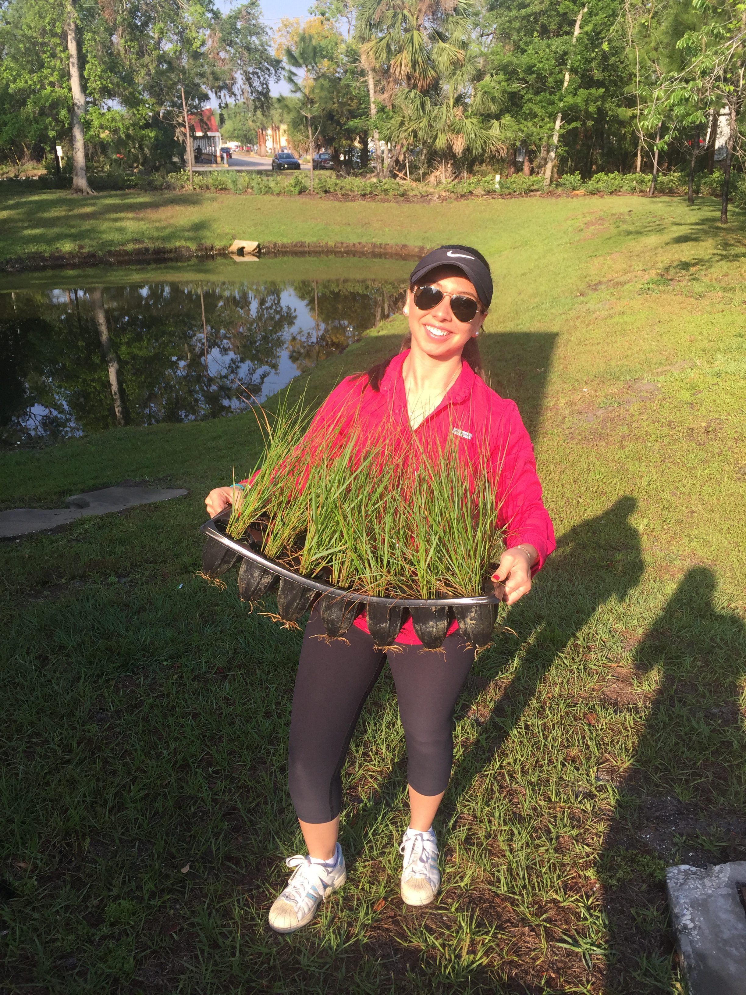 Andrea Orozco native grass planting 2 e1509632768484