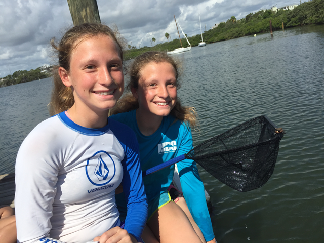 Lindsey (l) and Brooke (r) volunteering for camp in 2017